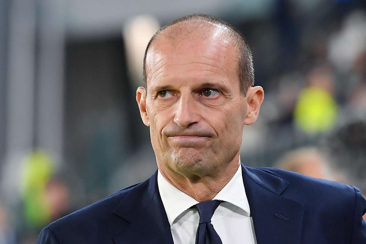 Primo piano di Max Allegri con un'espressione perplessa