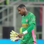 Maignan con la maglia verde del milan