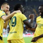 Giocatori del Milan festeggiano il gol di Fofana ad Udine